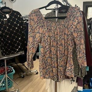 Women’s chap shirt size, large floral pattern
